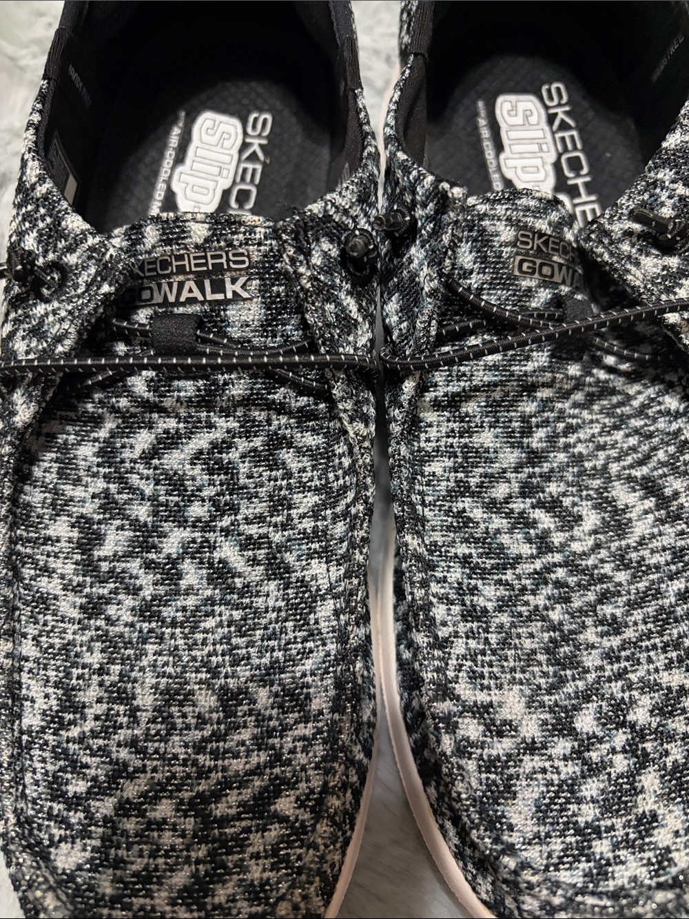 Skechers GO WALK Slip-ins featuring a black and white heathered knit upper. - Picture 8 of 8